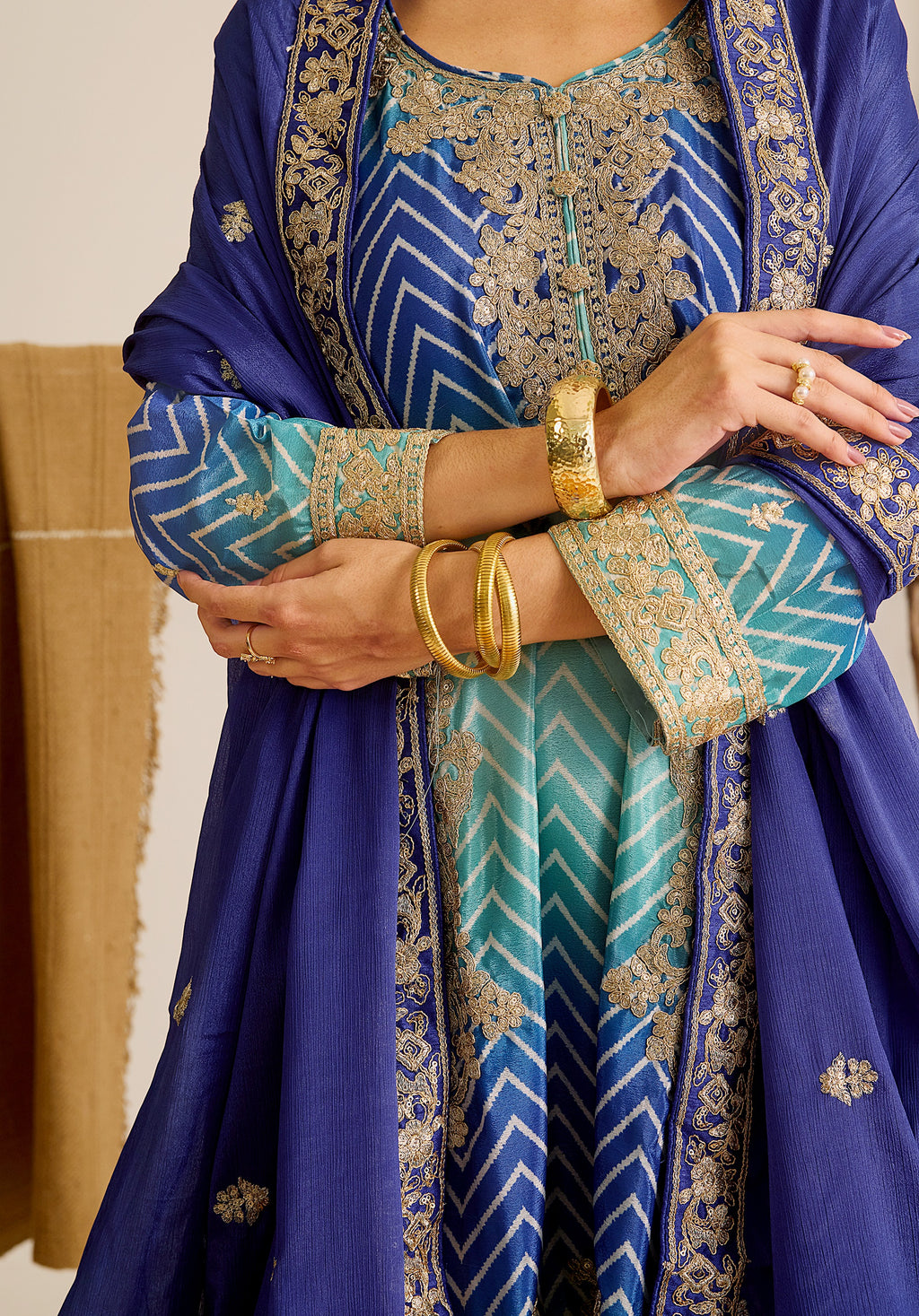 Royal blue and sky blue Leher suit Indian ethnic wear: premium chiffon silk with gold floral embroidery, gradient leheriya palazzo, tassel dupatta, buy salwar kameez online for ethereal vibe.