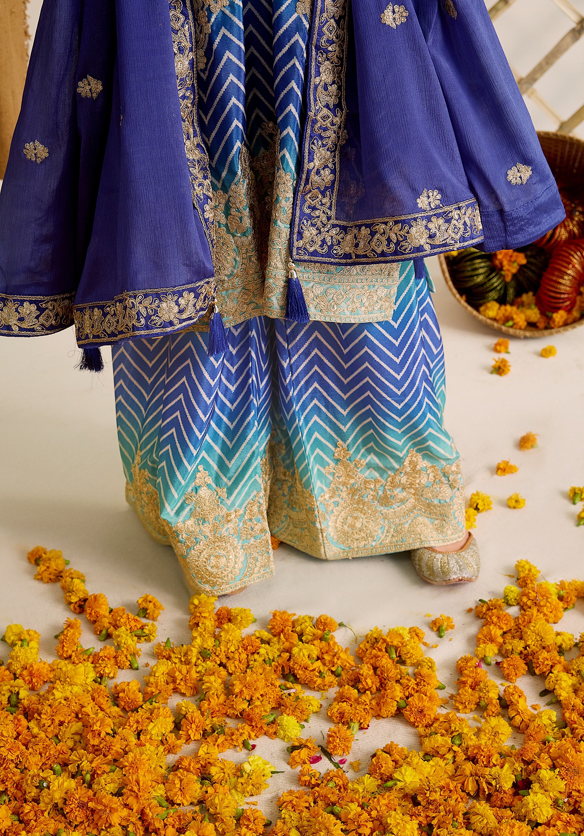 Royal blue and sky blue Leher suit Indian ethnic wear: premium chiffon silk with gold floral embroidery, gradient leheriya palazzo, tassel dupatta, buy salwar kameez online for ethereal vibe.