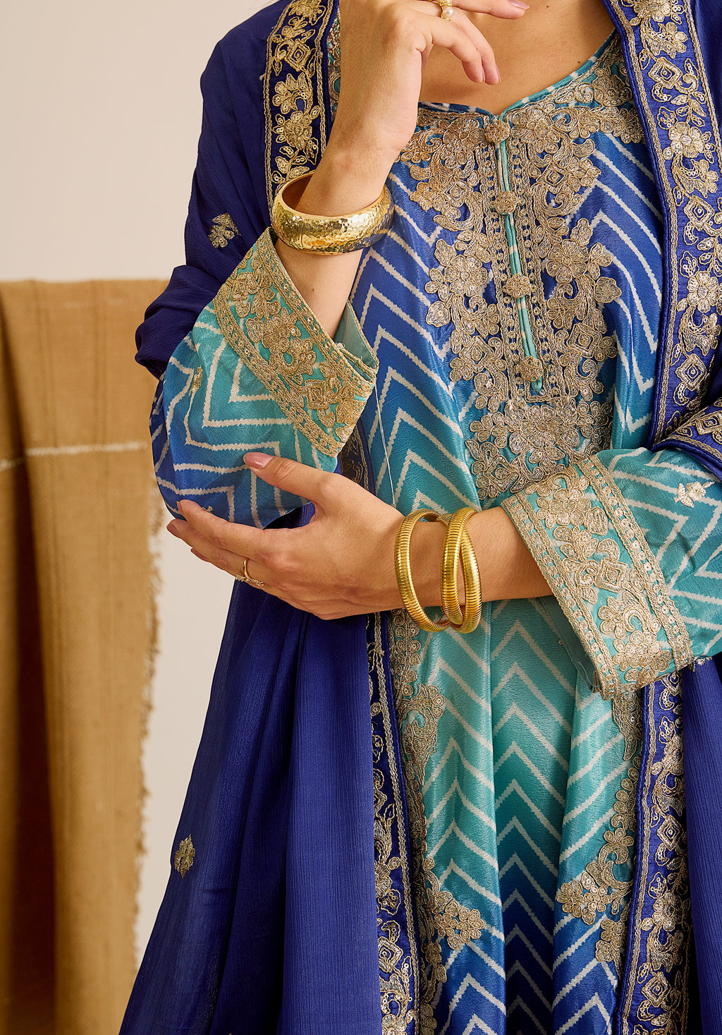 Royal blue and sky blue Leher suit Indian ethnic wear: premium chiffon silk with gold floral embroidery, gradient leheriya palazzo, tassel dupatta, buy salwar kameez online for ethereal vibe.