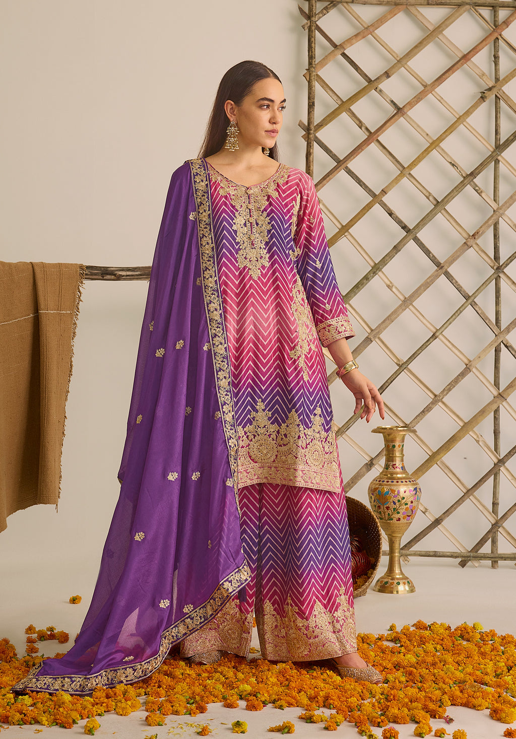 Magenta pink and royal purple Gulzaar suit Indian ethnic wear: premium chiffon silk with gold floral embroidery, gradient leheriya palazzo, tassel dupatta, buy salwar kameez online Gujarat inspired.