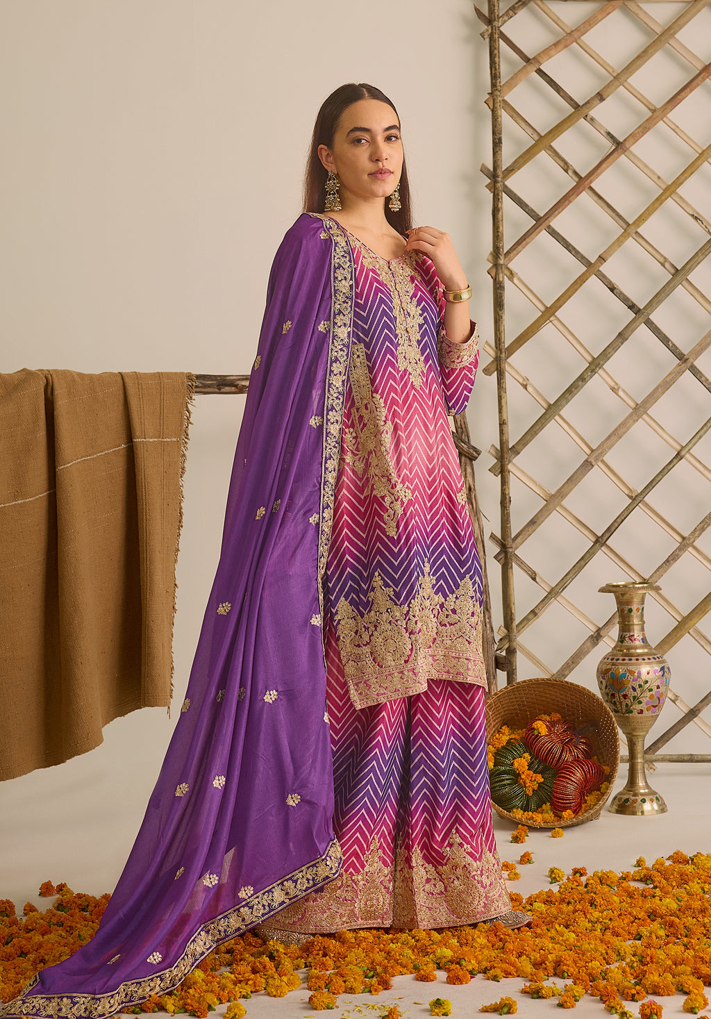 Magenta pink and royal purple Gulzaar suit Indian ethnic wear: premium chiffon silk with gold floral embroidery, gradient leheriya palazzo, tassel dupatta, buy salwar kameez online Gujarat inspired.