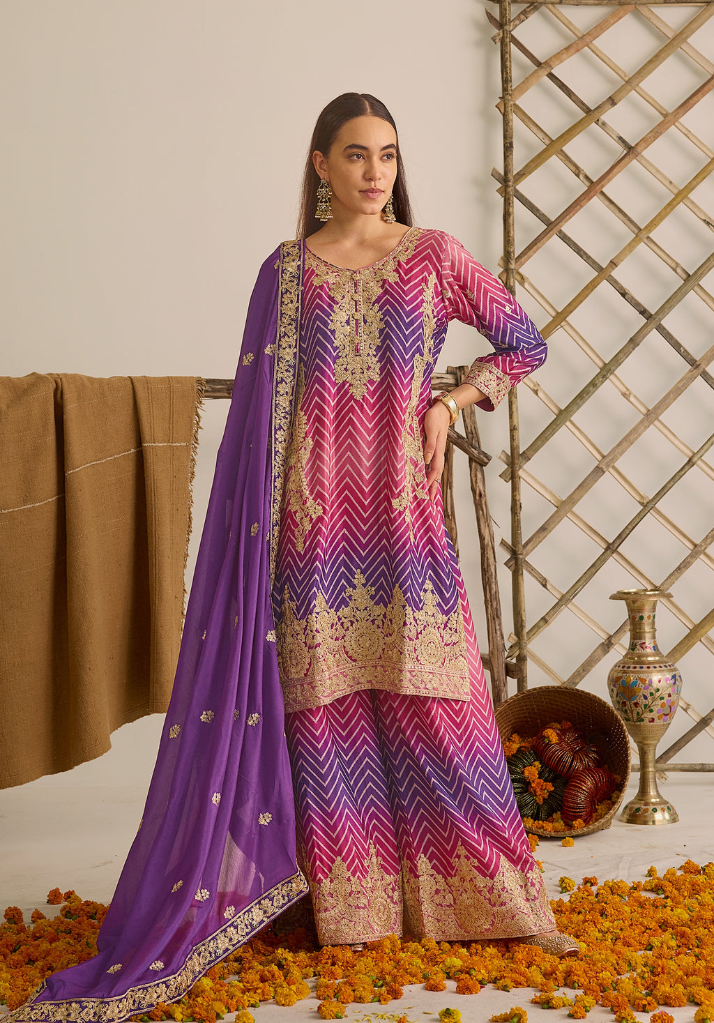 Magenta pink and royal purple Gulzaar suit Indian ethnic wear: premium chiffon silk with gold floral embroidery, gradient leheriya palazzo, tassel dupatta, buy salwar kameez online Gujarat inspired.