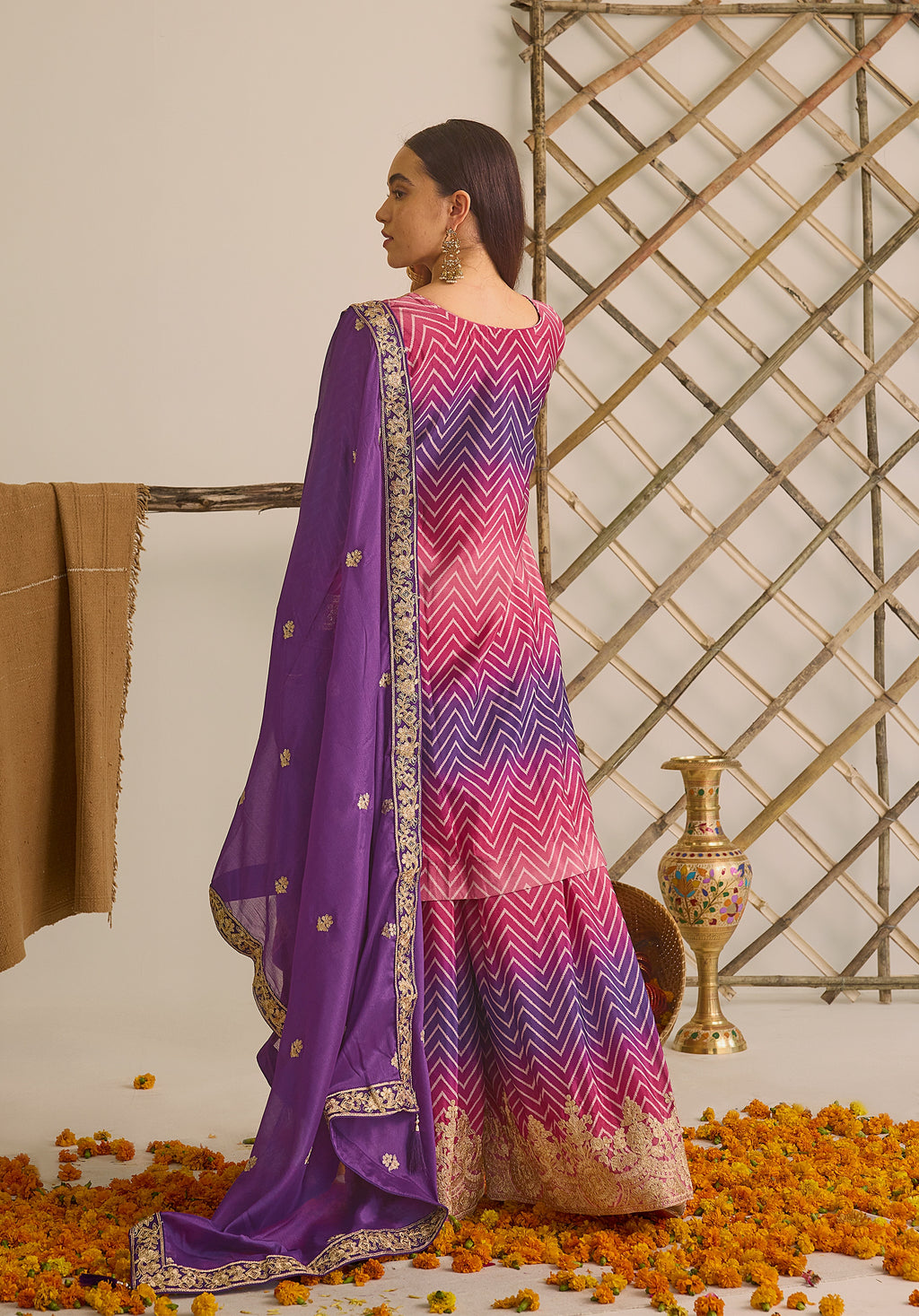 Magenta pink and royal purple Gulzaar suit Indian ethnic wear: premium chiffon silk with gold floral embroidery, gradient leheriya palazzo, tassel dupatta, buy salwar kameez online Gujarat inspired.