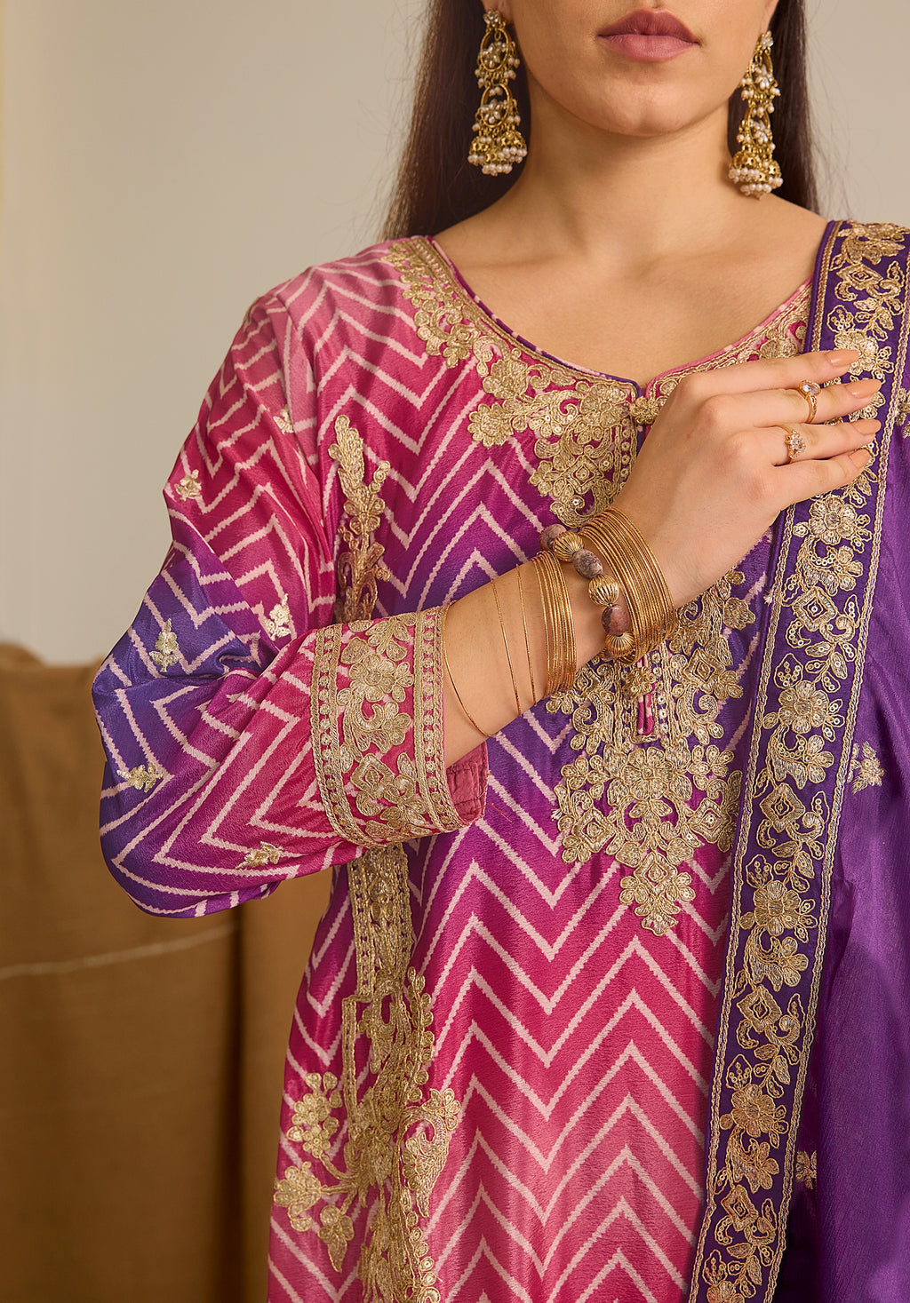 Magenta pink and royal purple Gulzaar suit Indian ethnic wear: premium chiffon silk with gold floral embroidery, gradient leheriya palazzo, tassel dupatta, buy salwar kameez online Gujarat inspired.