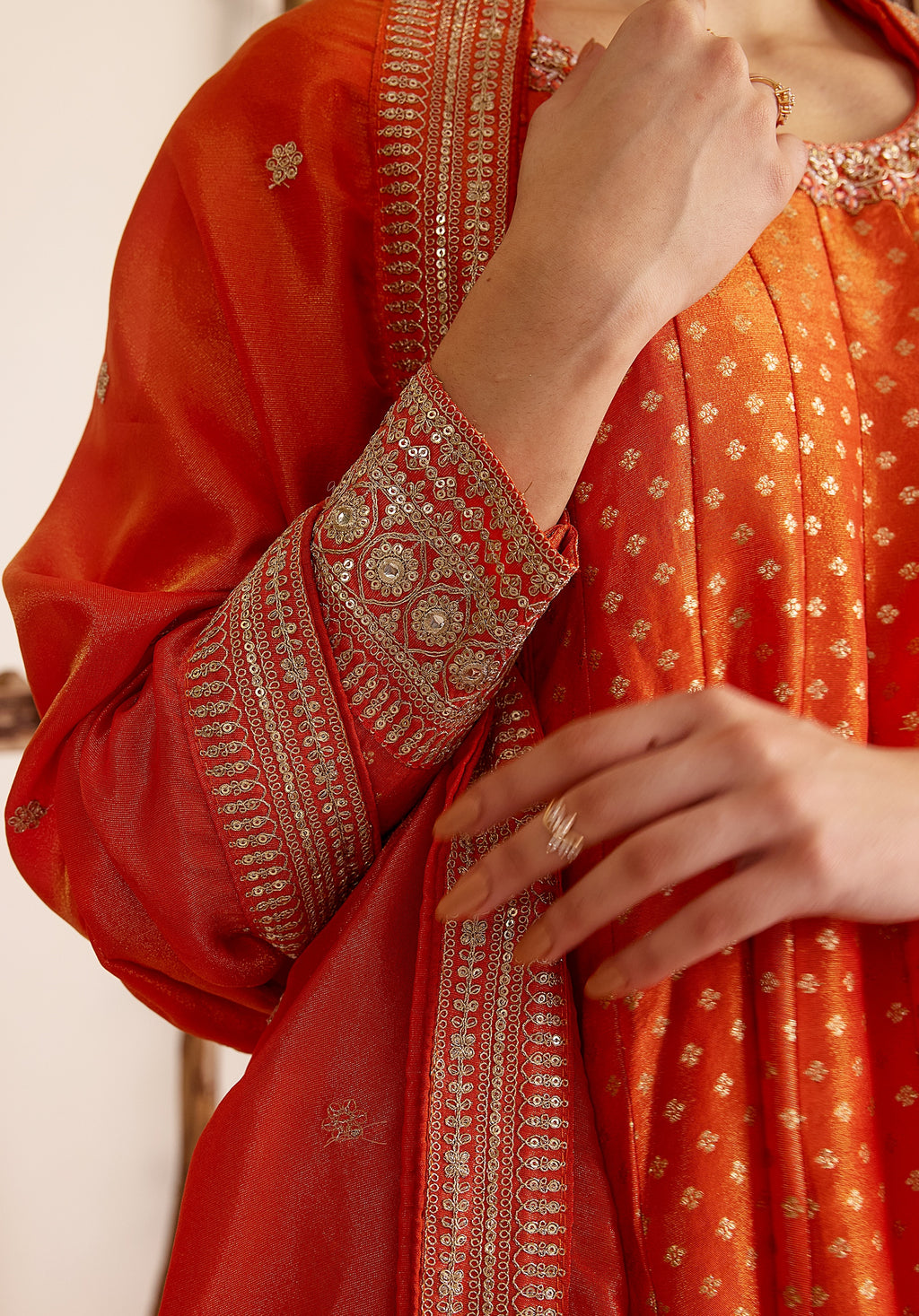 Crimson orange Kavya Anarkali suit Indian ethnic wear: pure organza jacquard silk with floral embroidery, flowing silhouette, buy salwar kameez online Banarasi premium for cultural events.