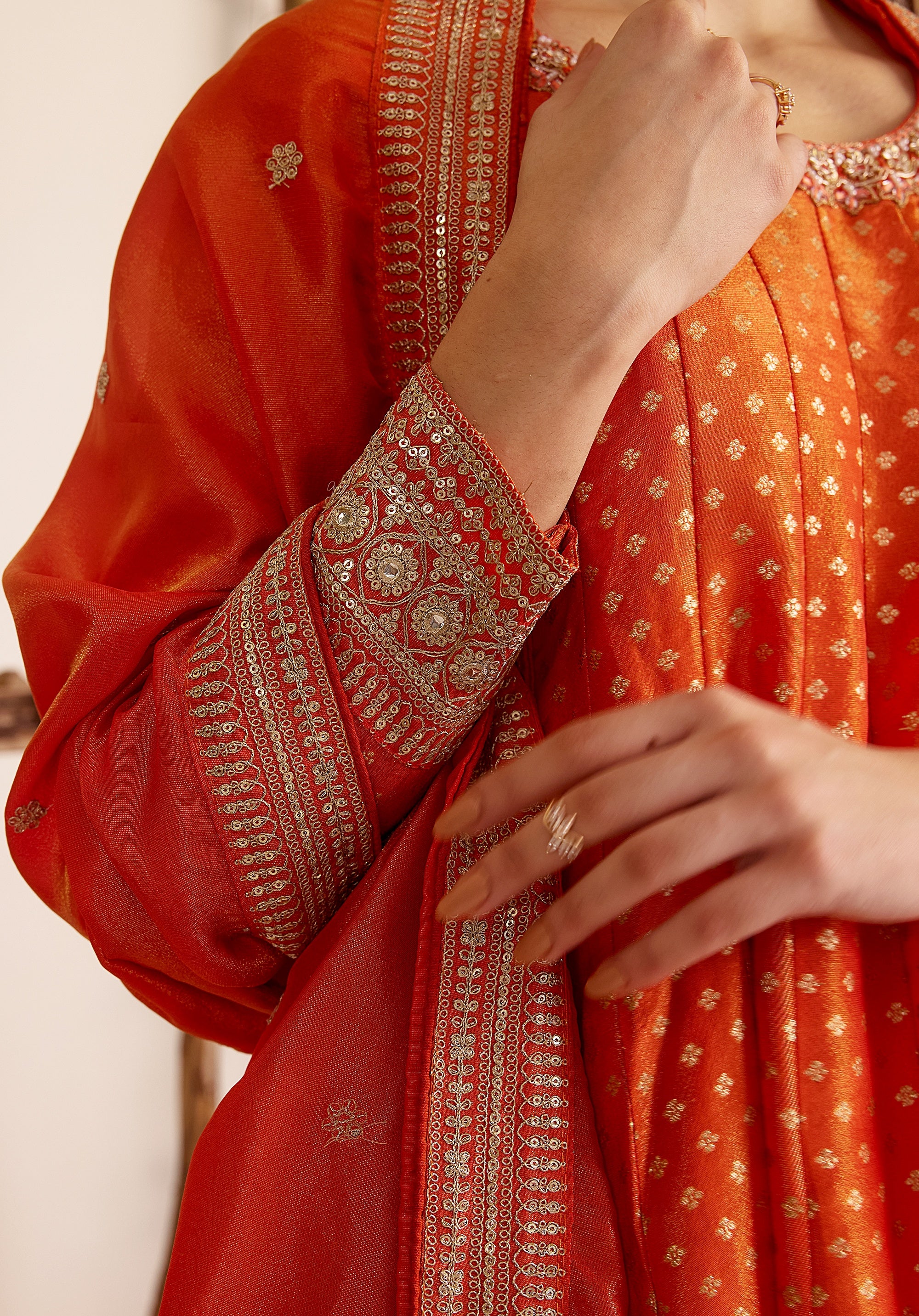 Crimson orange Kavya Anarkali suit Indian ethnic wear: pure organza jacquard silk with floral embroidery, flowing silhouette, buy salwar kameez online Banarasi premium for cultural events.