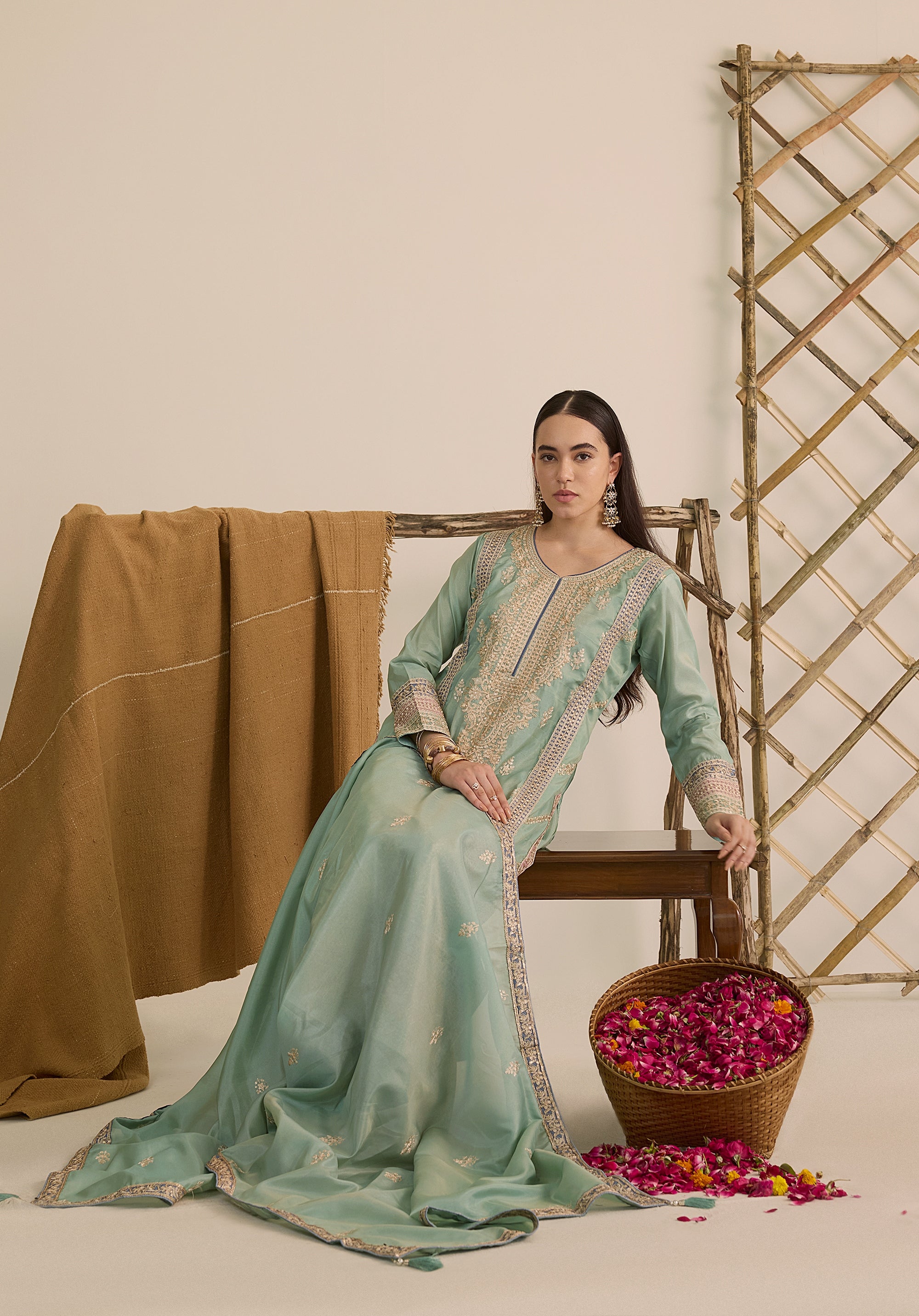 Mint green Vaidehi suit Indian ethnic wear: premium silk with gold floral zardozi embroidery, ornate printed palazzo, graceful dupatta, buy salwar kameez online with intricate gotta details.