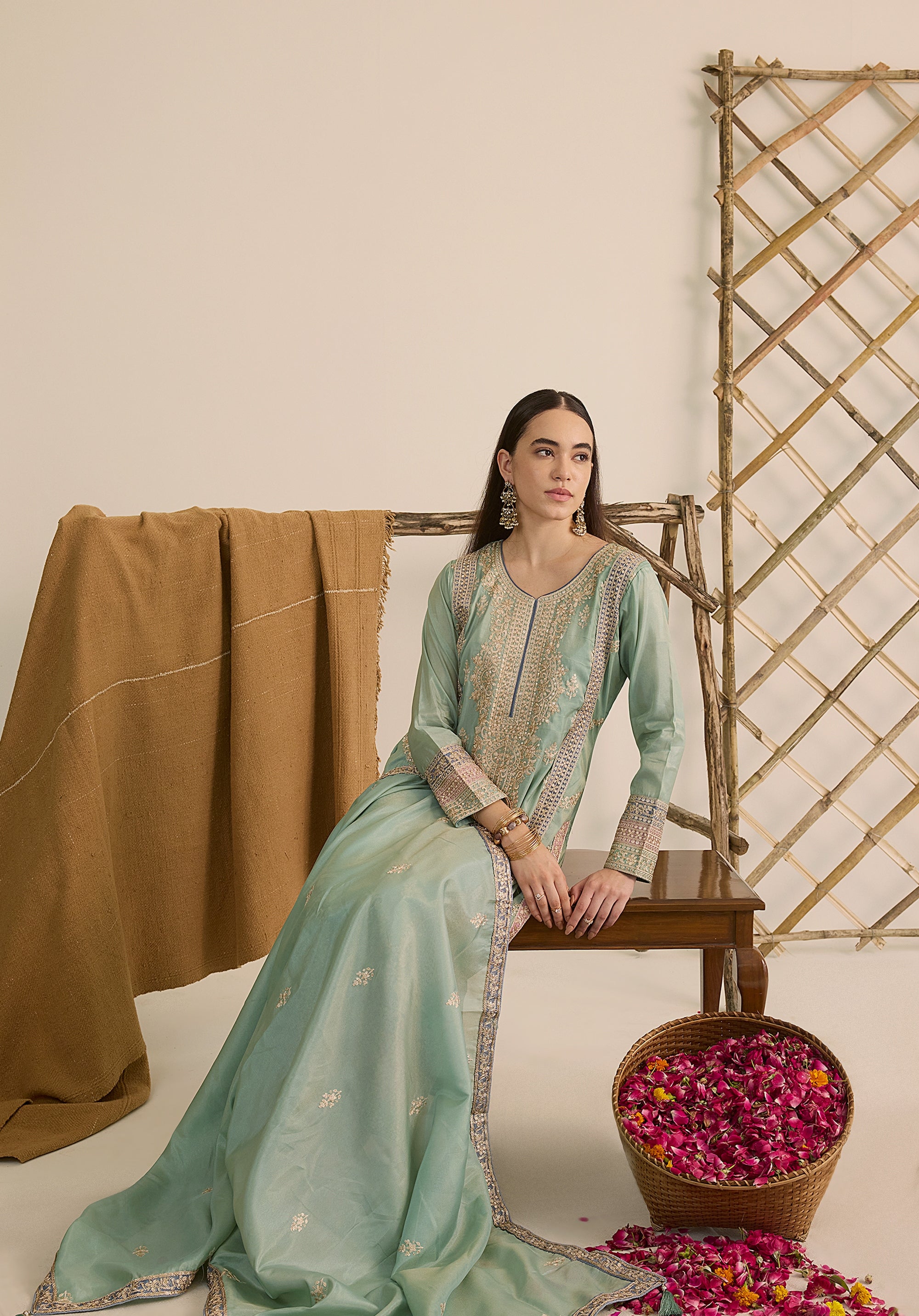 Mint green Vaidehi suit Indian ethnic wear: premium silk with gold floral zardozi embroidery, ornate printed palazzo, graceful dupatta, buy salwar kameez online with intricate gotta details.