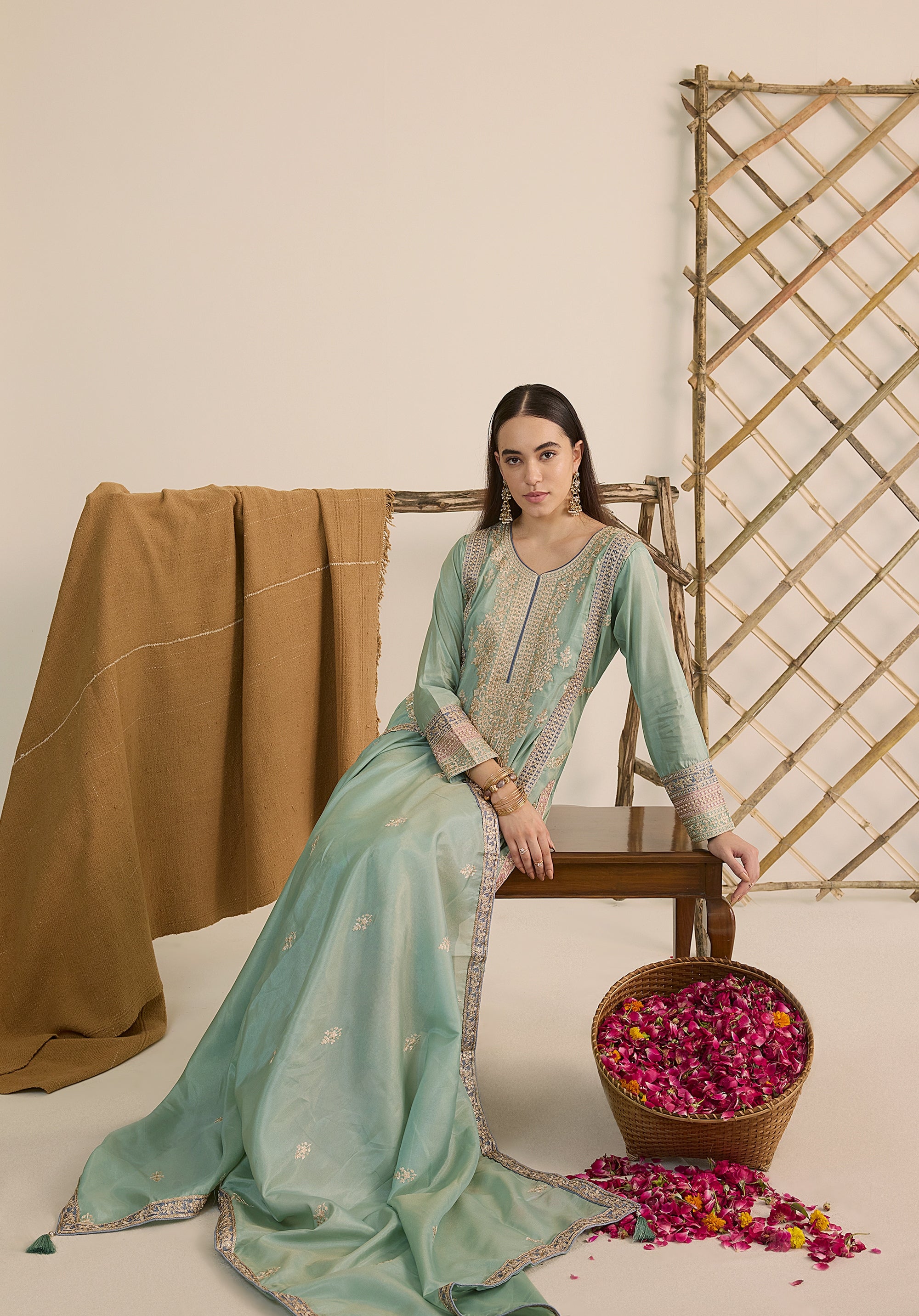 Mint green Vaidehi suit Indian ethnic wear: premium silk with gold floral zardozi embroidery, ornate printed palazzo, graceful dupatta, buy salwar kameez online with intricate gotta details.