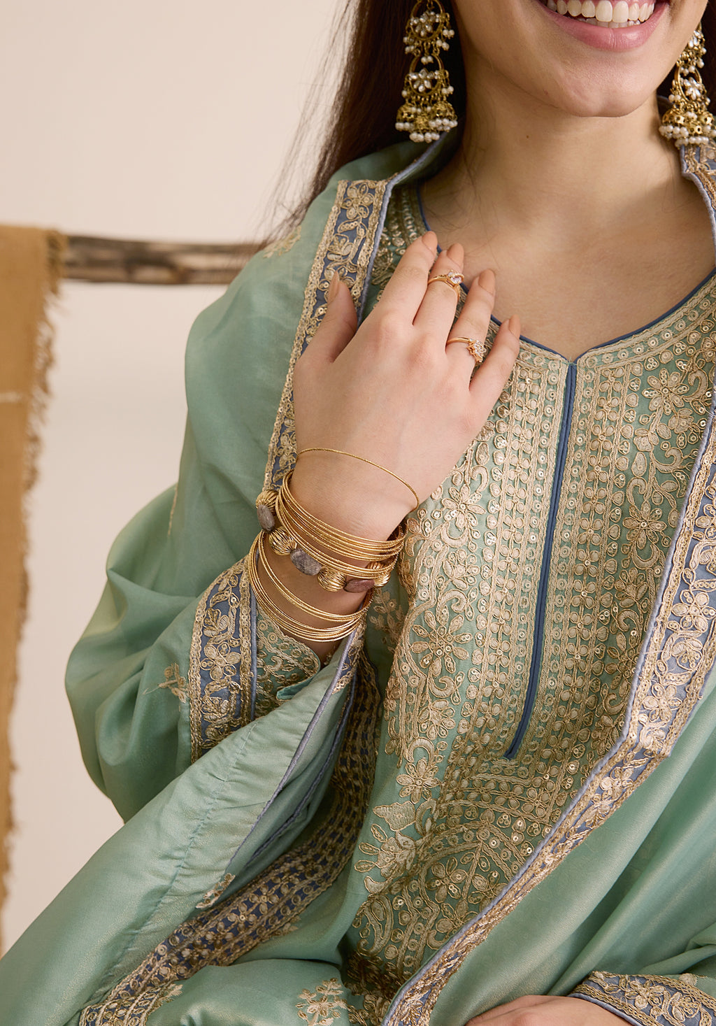 Mint green Vaidehi suit Indian ethnic wear: premium silk with gold floral zardozi embroidery, ornate printed palazzo, graceful dupatta, buy salwar kameez online with intricate gotta details.