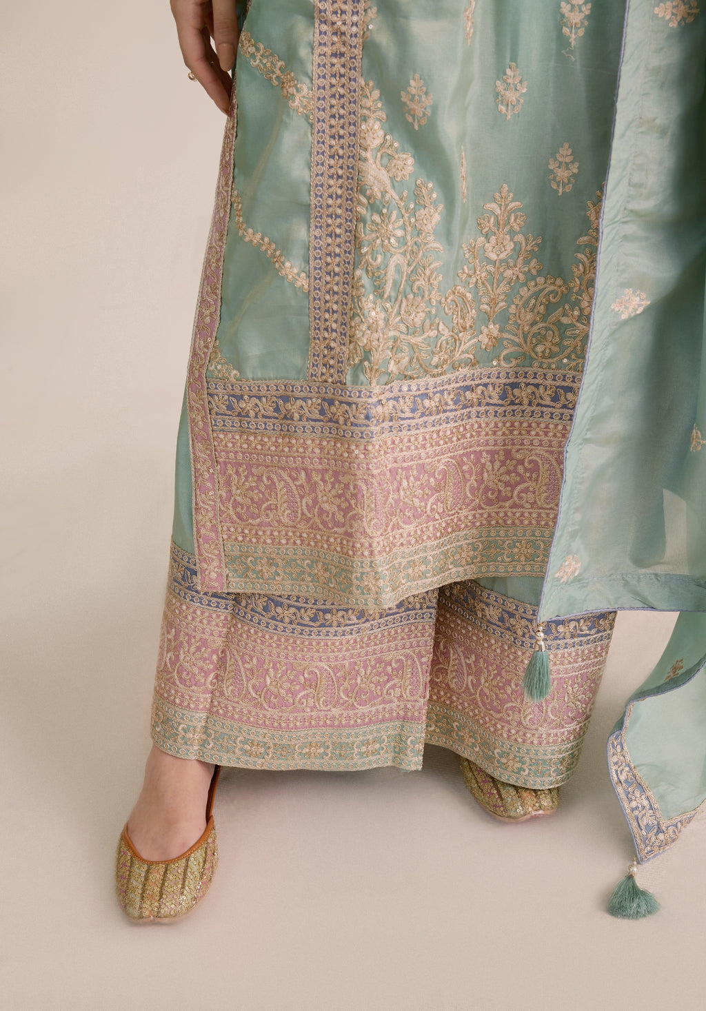 Mint green Vaidehi suit Indian ethnic wear: premium silk with gold floral zardozi embroidery, ornate printed palazzo, graceful dupatta, buy salwar kameez online with intricate gotta details.