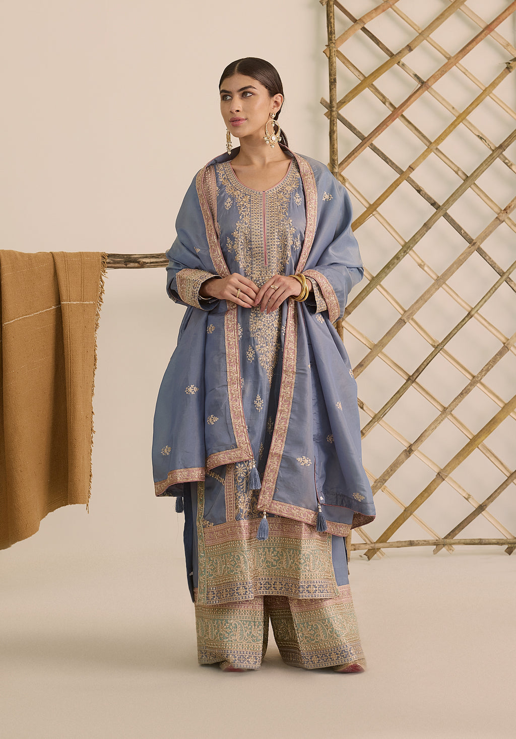 Soft blue and pink Ruhani suit Indian ethnic wear: premium silk with gold floral zardozi work, printed palazzo gold borders, embellished dupatta, buy salwar kameez online for traditional elegance.