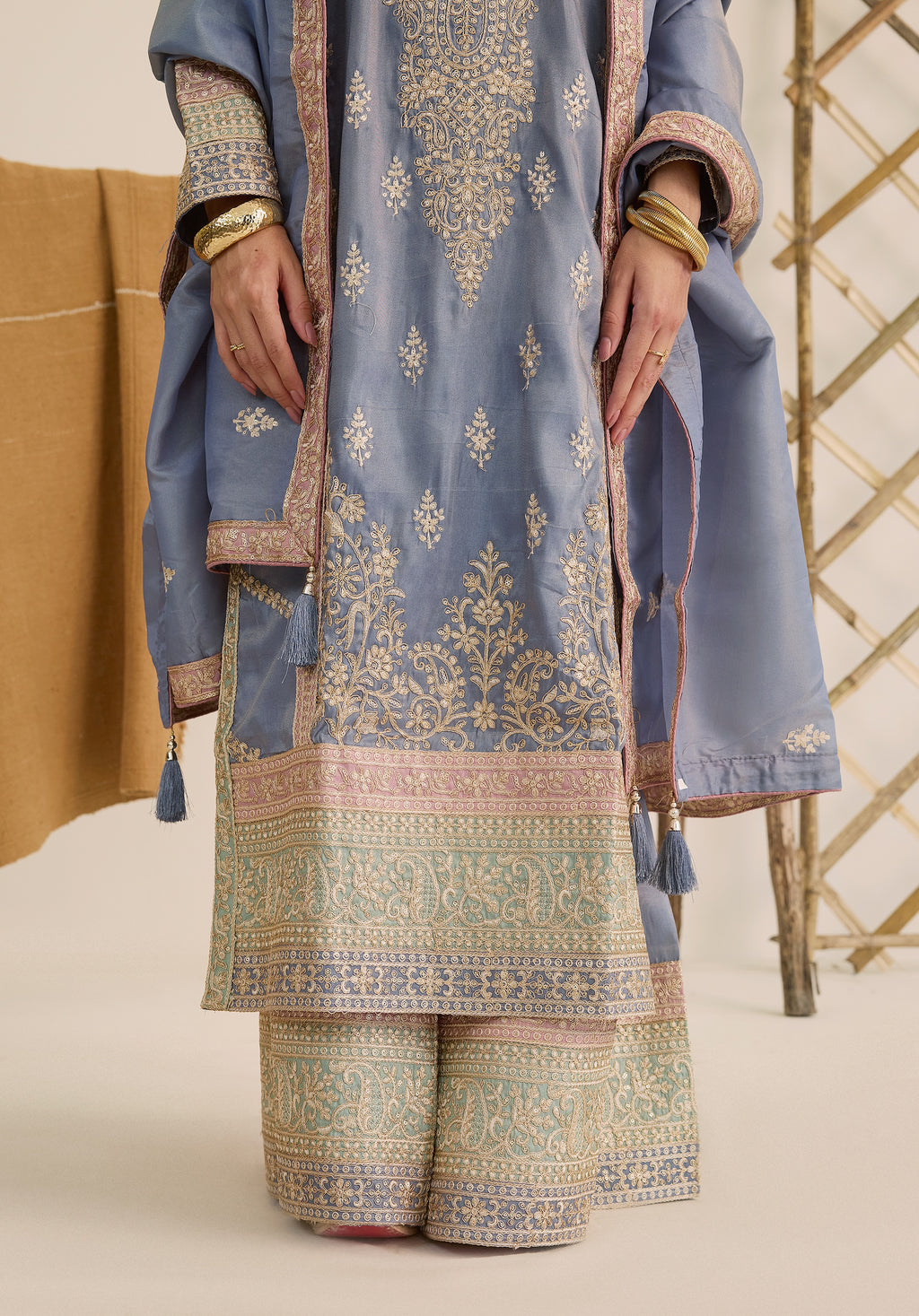 Soft blue and pink Ruhani suit Indian ethnic wear: premium silk with gold floral zardozi work, printed palazzo gold borders, embellished dupatta, buy salwar kameez online for traditional elegance.