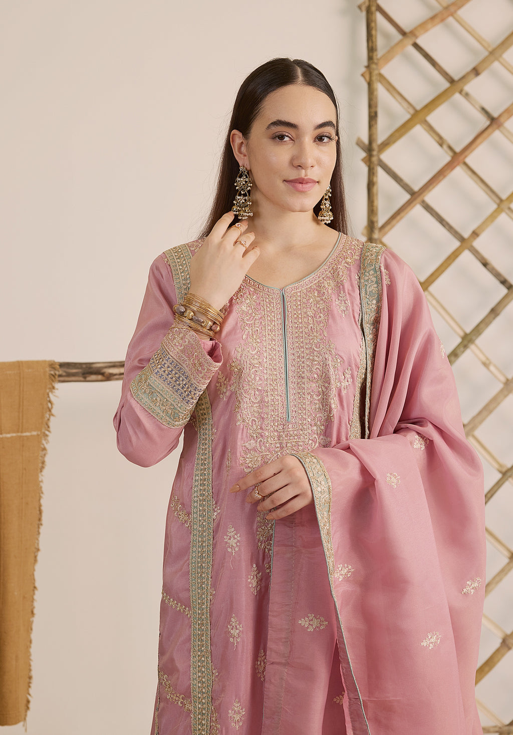 Pastel pink Inaayat suit Indian ethnic wear: premium silk with gold floral zardozi work, printed palazzo gold borders, embellished dupatta, buy salwar kameez online with gotta detailing.