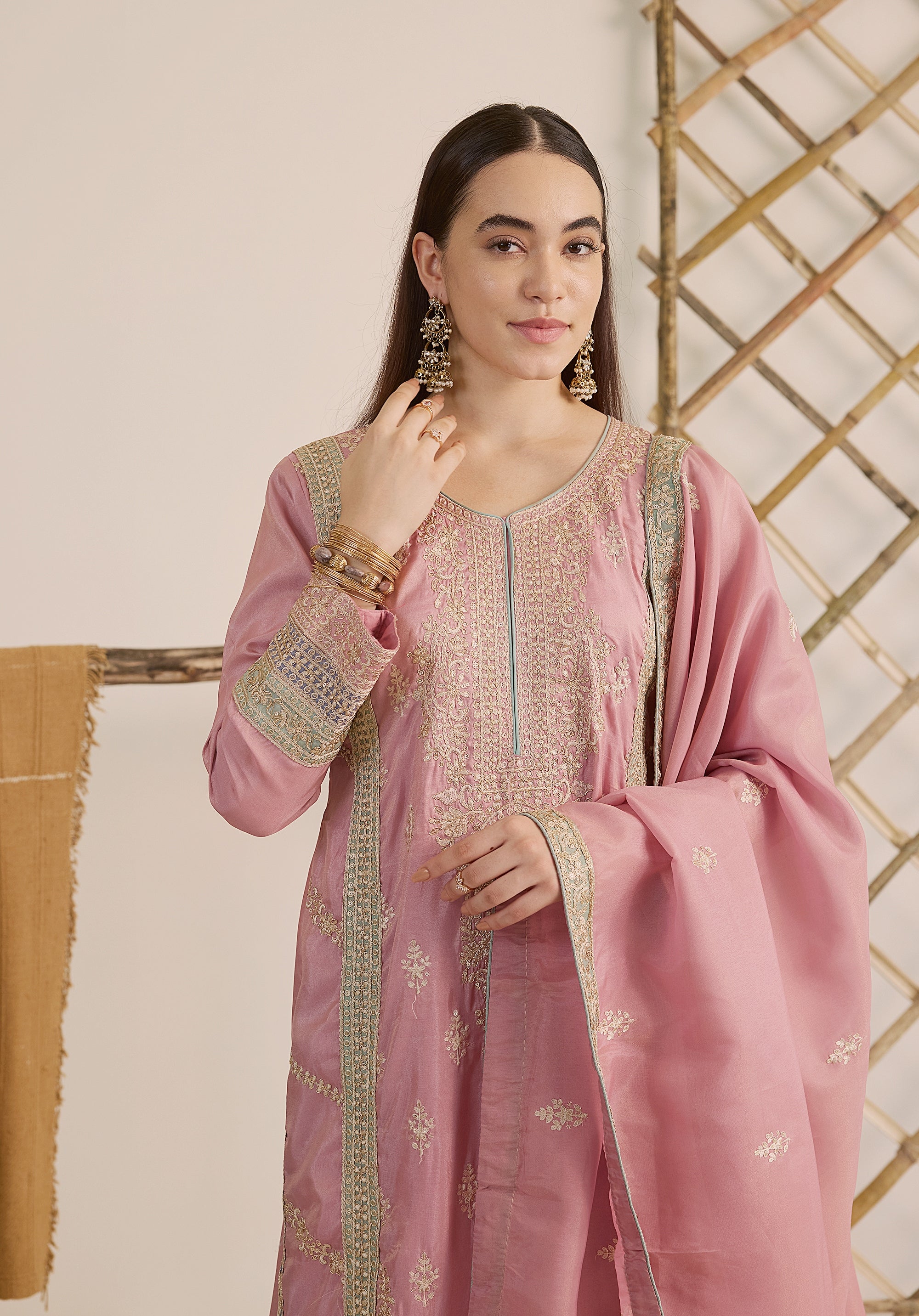 Pastel pink Inaayat suit Indian ethnic wear: premium silk with gold floral zardozi work, printed palazzo gold borders, embellished dupatta, buy salwar kameez online with gotta detailing.