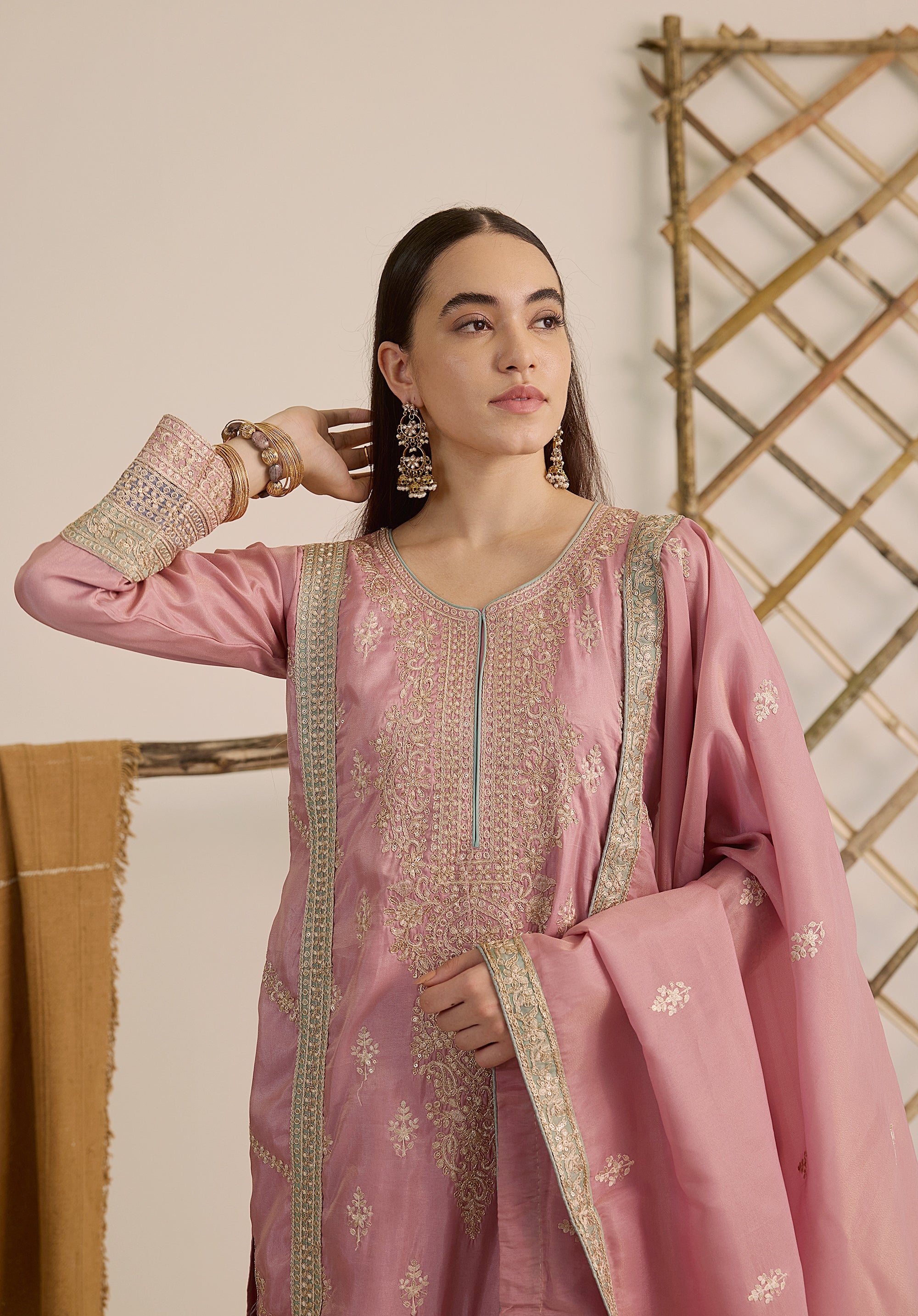 Pastel pink Inaayat suit Indian ethnic wear: premium silk with gold floral zardozi work, printed palazzo gold borders, embellished dupatta, buy salwar kameez online with gotta detailing.