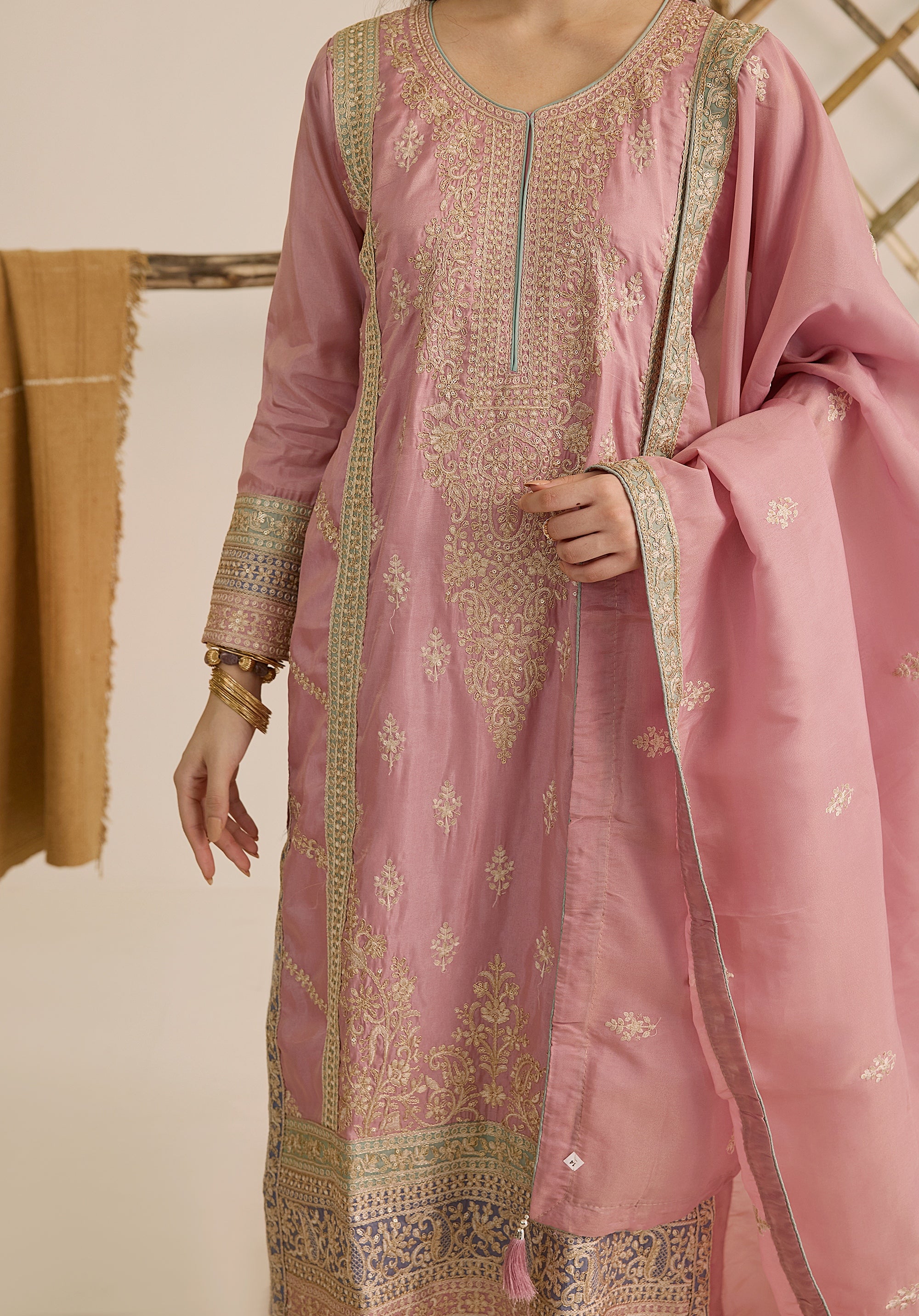 Pastel pink Inaayat suit Indian ethnic wear: premium silk with gold floral zardozi work, printed palazzo gold borders, embellished dupatta, buy salwar kameez online with gotta detailing.