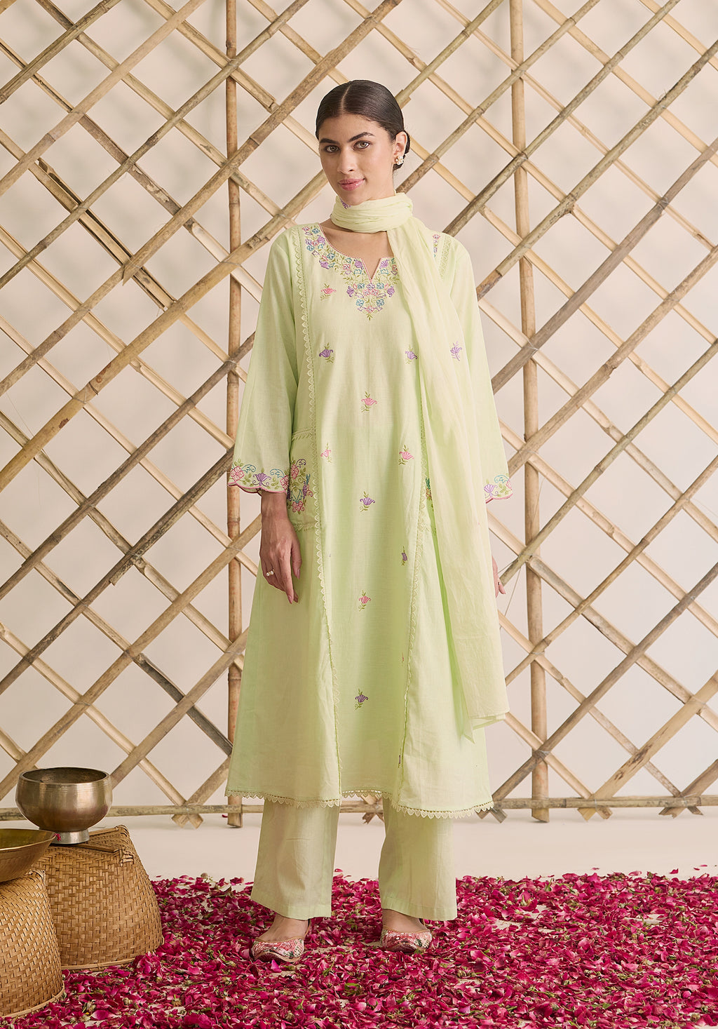 Light sage green Noor Kashmiri suit Indian ethnic wear: premium cotton with multicolored floral motifs, tailored straight pants, star-embroidered dupatta, buy salwar kameez online Kashmir collection.