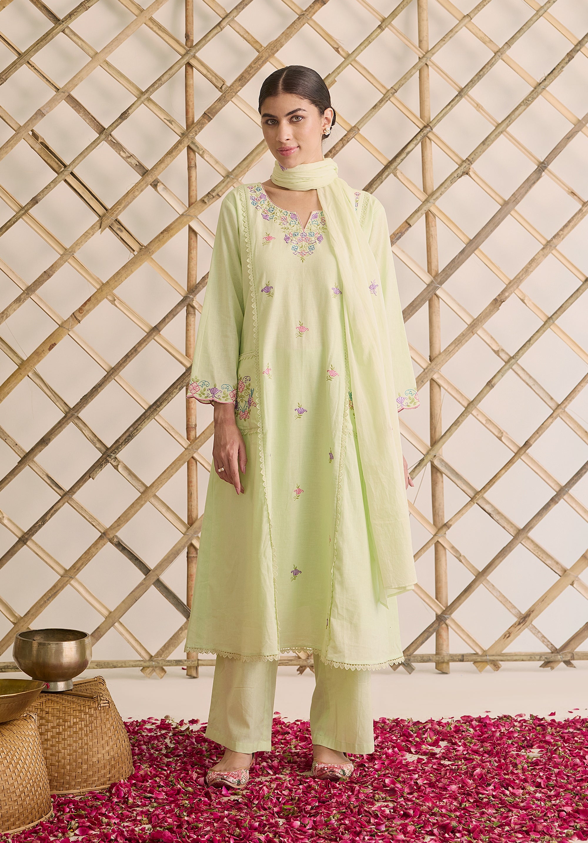 Light sage green Noor Kashmiri suit Indian ethnic wear: premium cotton with multicolored floral motifs, tailored straight pants, star-embroidered dupatta, buy salwar kameez online Kashmir collection.