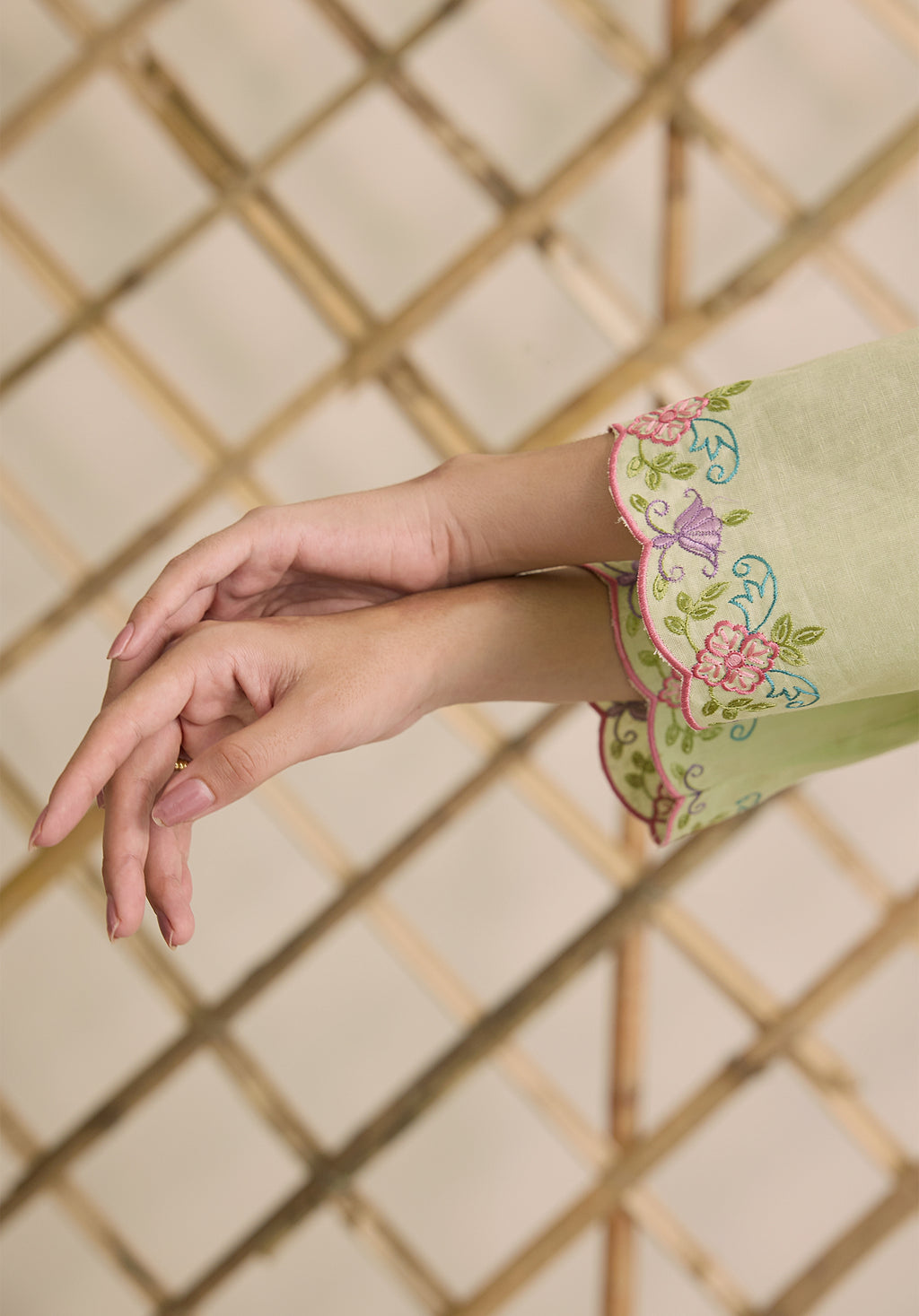 Light sage green Noor Kashmiri suit Indian ethnic wear: premium cotton with multicolored floral motifs, tailored straight pants, star-embroidered dupatta, buy salwar kameez online Kashmir collection.