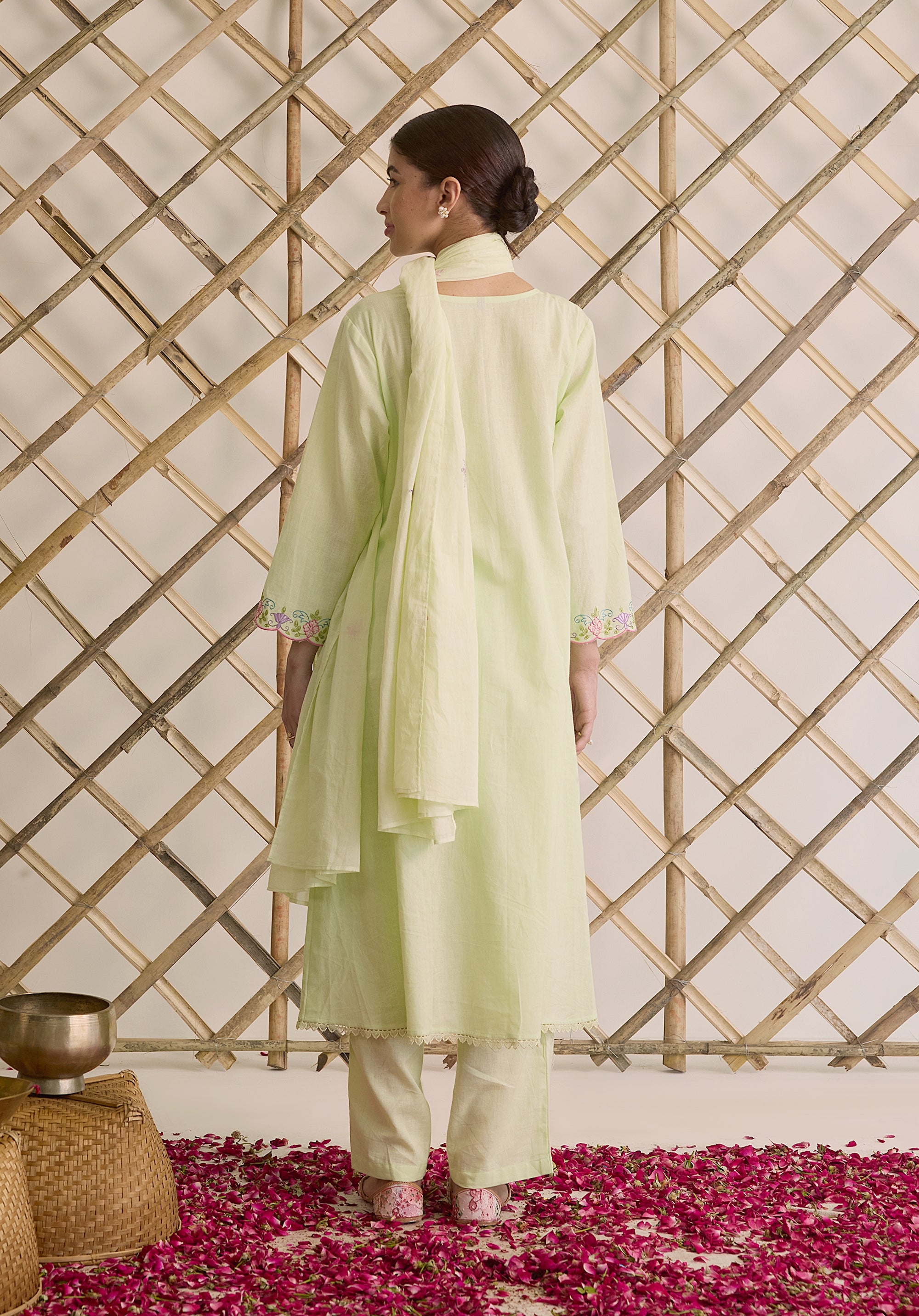 Light sage green Noor Kashmiri suit Indian ethnic wear: premium cotton with multicolored floral motifs, tailored straight pants, star-embroidered dupatta, buy salwar kameez online Kashmir collection.