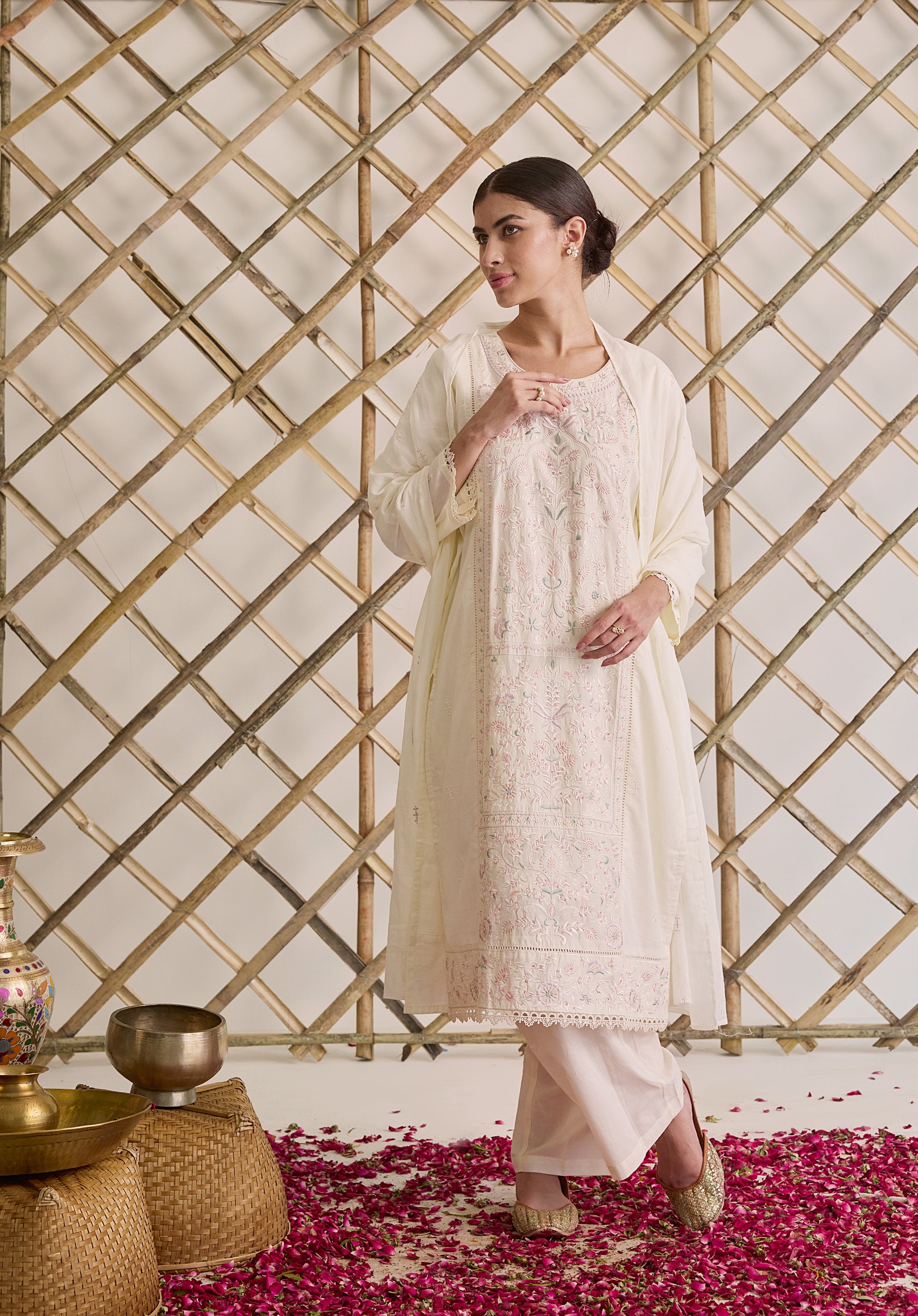 Off white Subha Kashmiri suit Indian ethnic wear: premium cotton with multicolored floral motifs embroidery, straight pants, star-scattered dupatta, buy salwar kameez online for elegant traditional look.