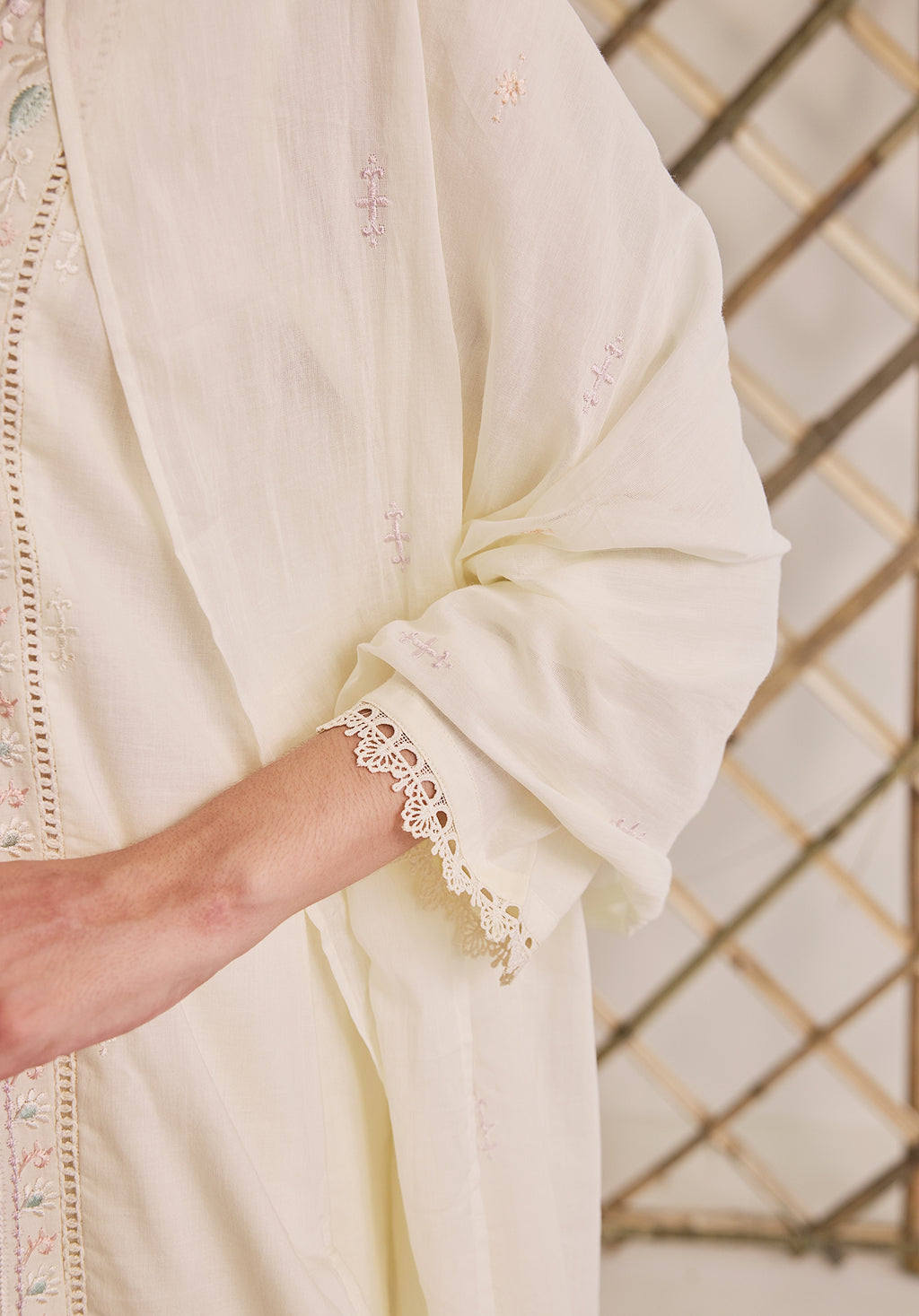 Off white Subha Kashmiri suit Indian ethnic wear: premium cotton with multicolored floral motifs embroidery, straight pants, star-scattered dupatta, buy salwar kameez online for elegant traditional look.