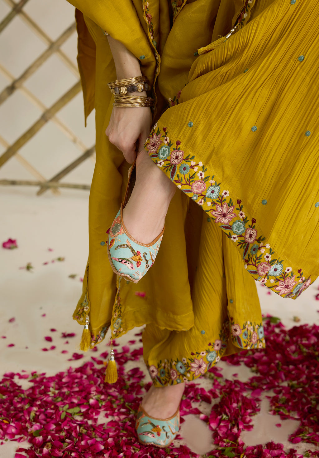 Mustard yellow Nitya suit Indian ethnic wear: premium silk with gold floral zardozi embroidery, ornate printed palazzo, graceful dupatta, buy salwar kameez online with floral designs.