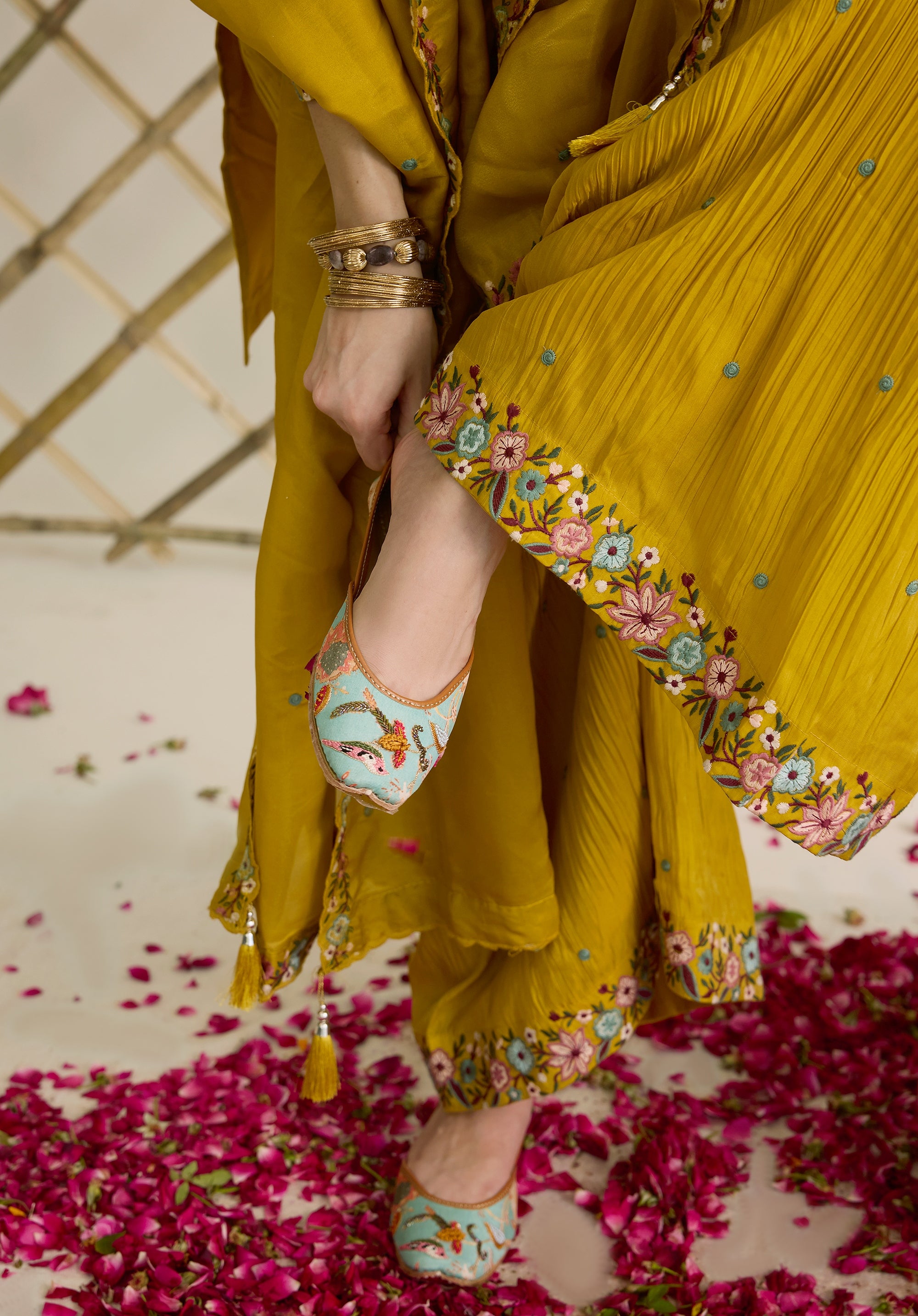 Mustard yellow Nitya suit Indian ethnic wear: premium silk with gold floral zardozi embroidery, ornate printed palazzo, graceful dupatta, buy salwar kameez online with floral designs.