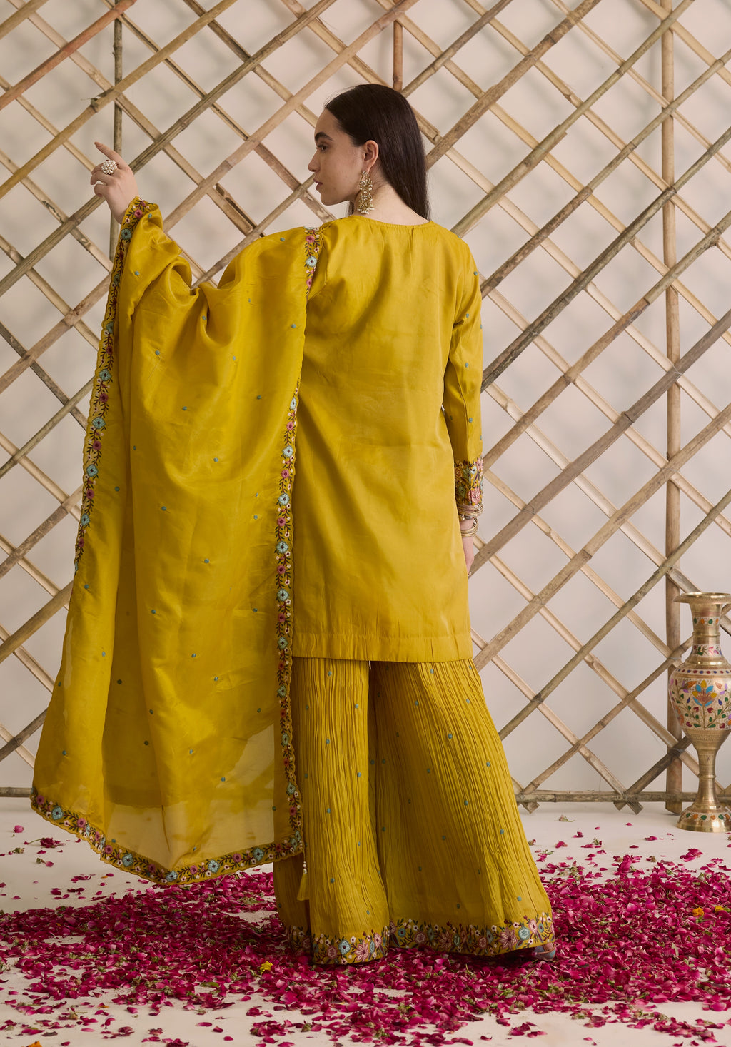 Mustard yellow Nitya suit Indian ethnic wear: premium silk with gold floral zardozi embroidery, ornate printed palazzo, graceful dupatta, buy salwar kameez online with floral designs.