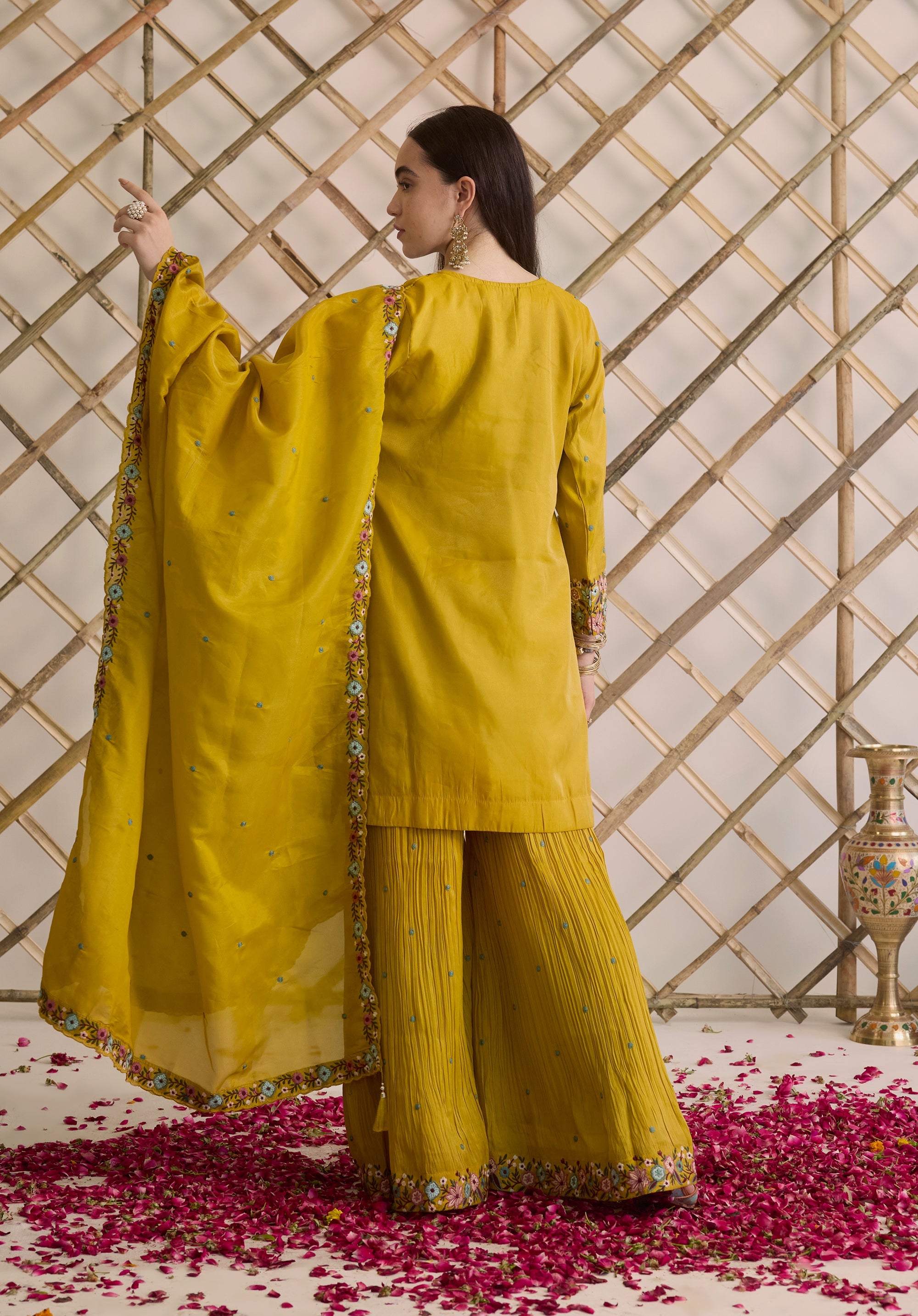 Mustard yellow Nitya suit Indian ethnic wear: premium silk with gold floral zardozi embroidery, ornate printed palazzo, graceful dupatta, buy salwar kameez online with floral designs.