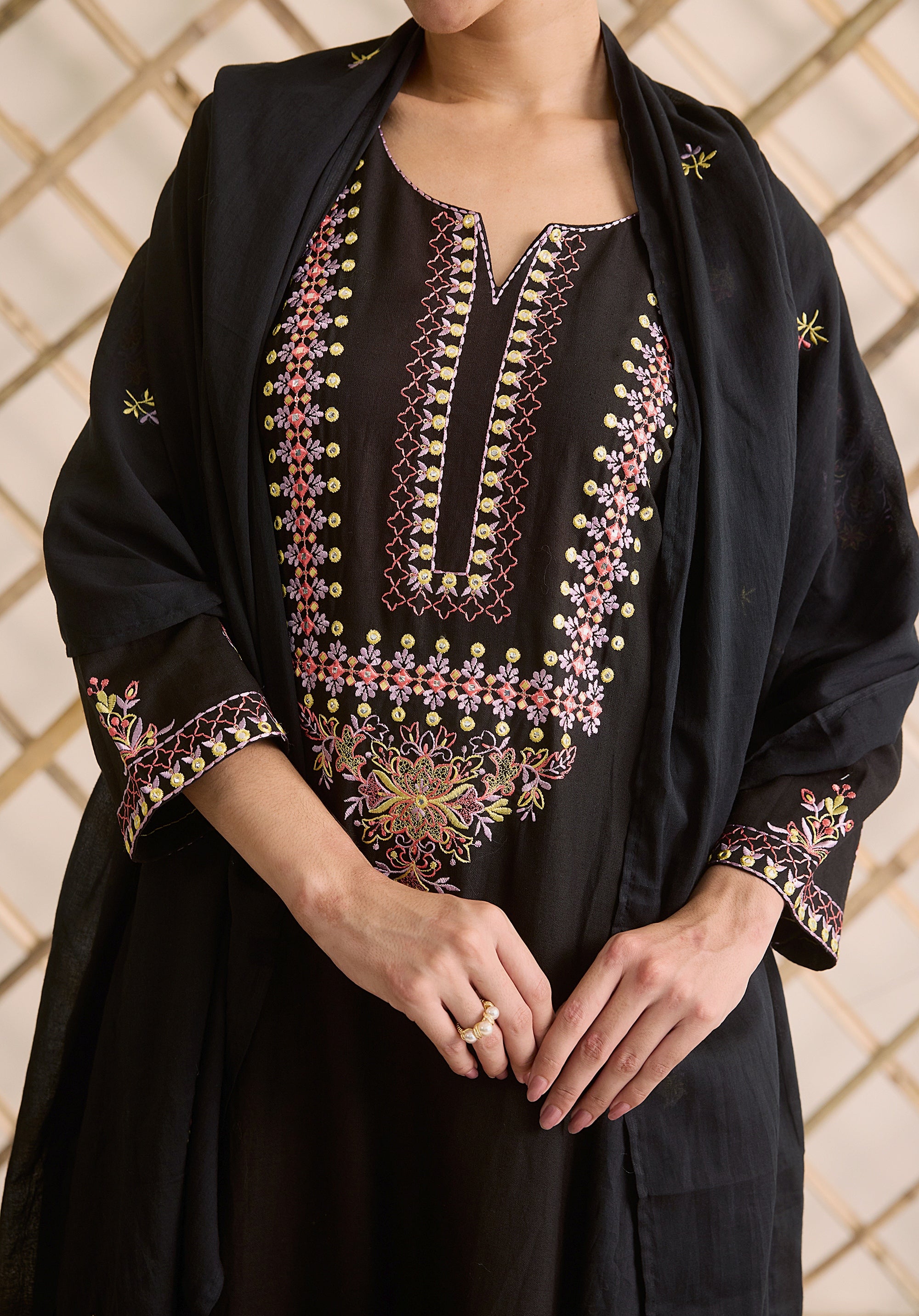 Night black Meher Kashmiri suit Indian ethnic wear: premium cotton with multicolored motifs embroidery, sleek straight pants, star-scattered dupatta, buy salwar kameez online for sophisticated ethnic style.