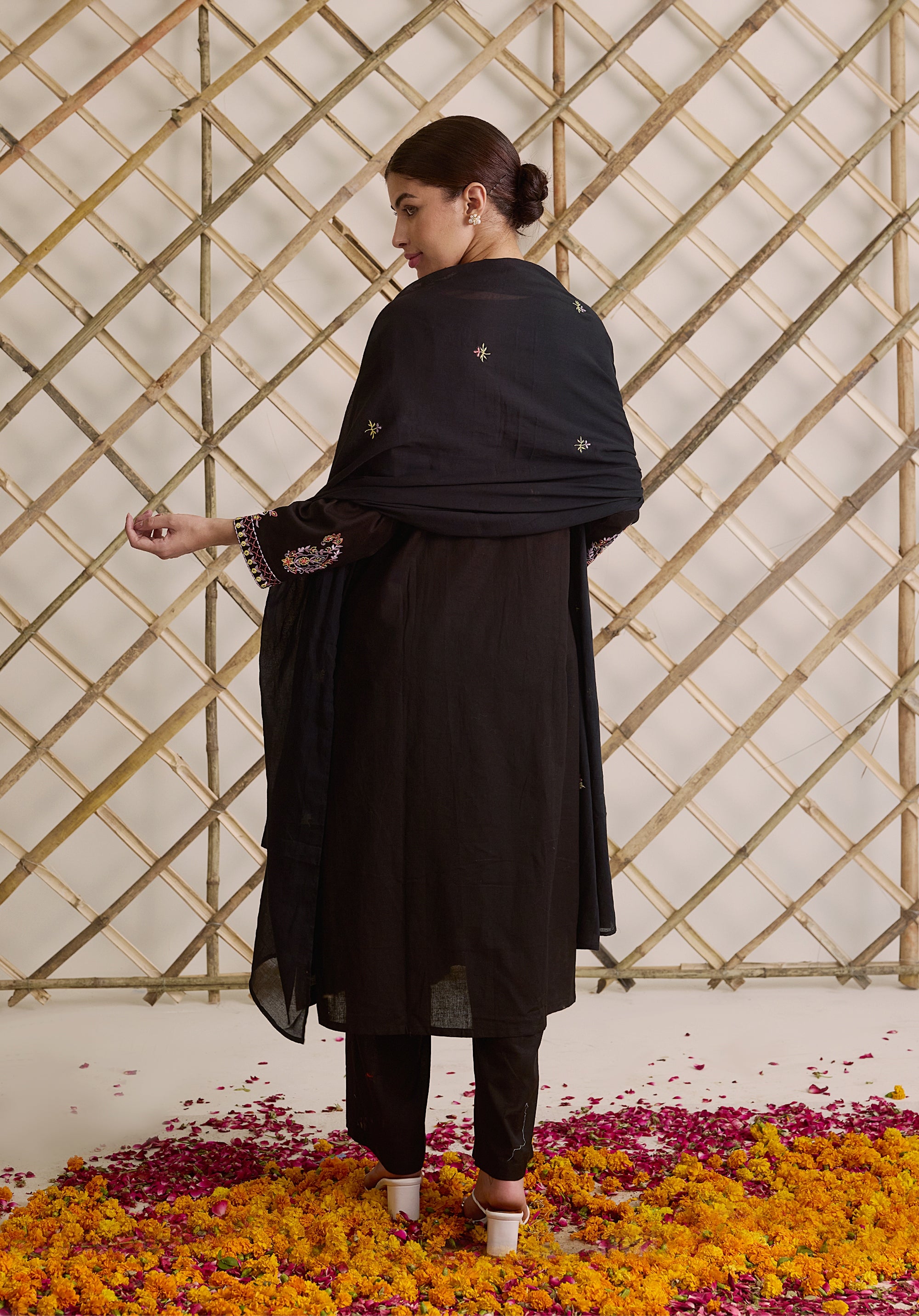 Night black Meher Kashmiri suit Indian ethnic wear: premium cotton with multicolored motifs embroidery, sleek straight pants, star-scattered dupatta, buy salwar kameez online for sophisticated ethnic style.